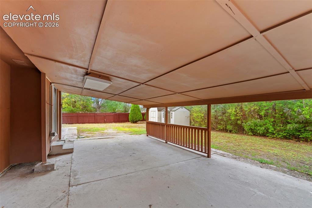 Image 26 of 38: Huge covered patio