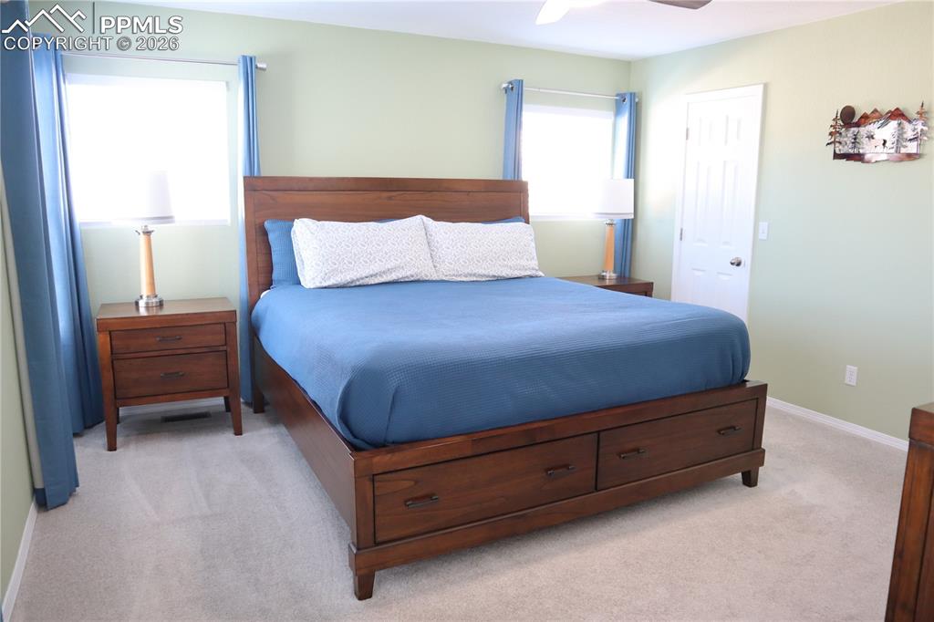 Image 15 of 34: Leading to Full Bath and Two Bedrooms.