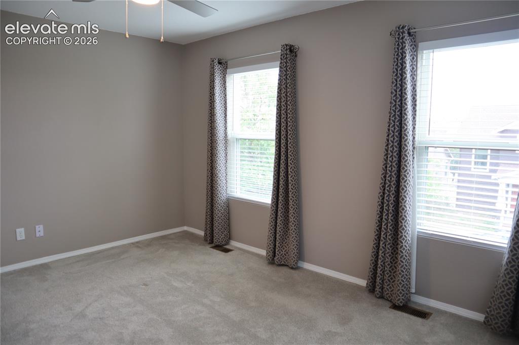 Image 16 of 34: Upstairs Second Bedroom.