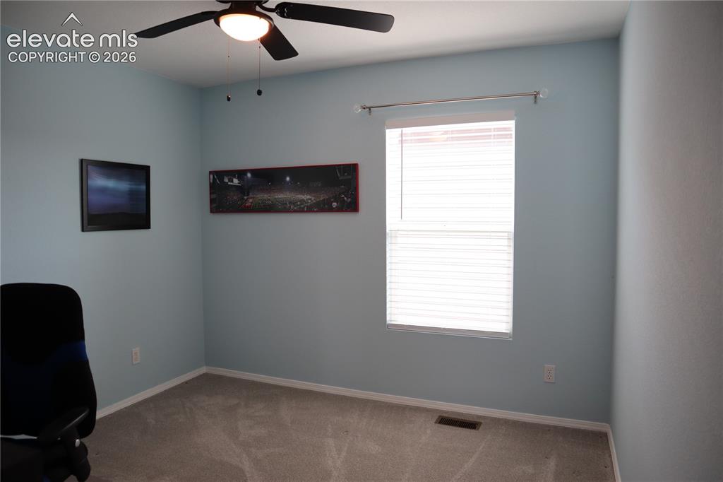 Image 18 of 34: Upstairs Third Bedroom.