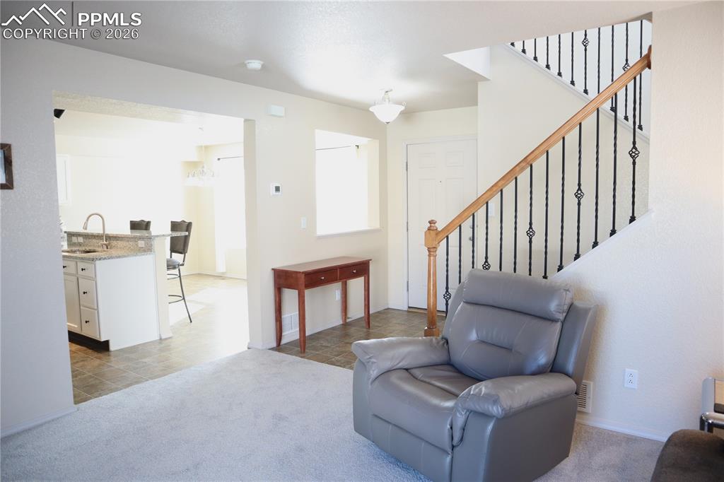 Image 2 of 34: Entry into the Living Room.
