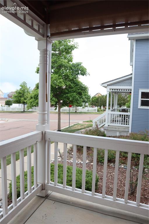 Image 31 of 34: Front Porch with View of Pikes Peak