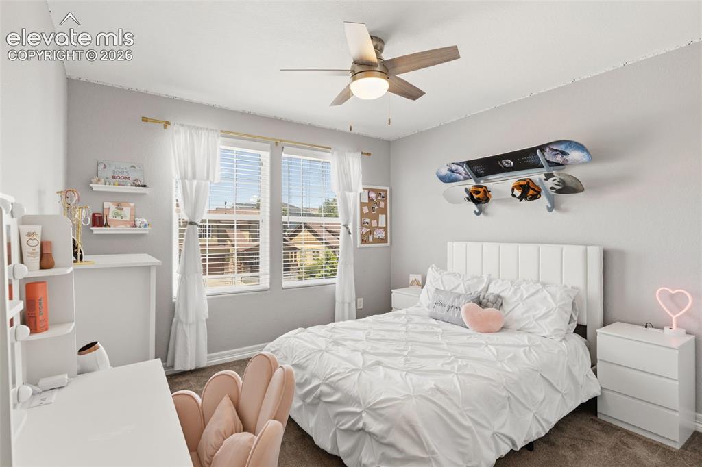 Image 29 of 41: Second of two secondary upper level bedrooms