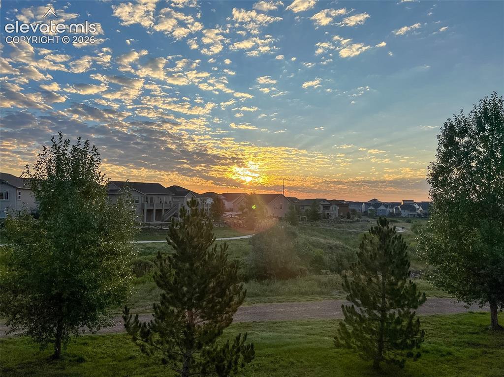 Image 37 of 41: Just one amazing sunrise from the back deck of this incredibly located home