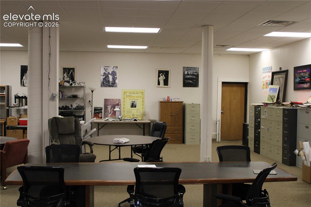 Image 3 of 11: The primary office on the main floor is finished and ready for use. All fur