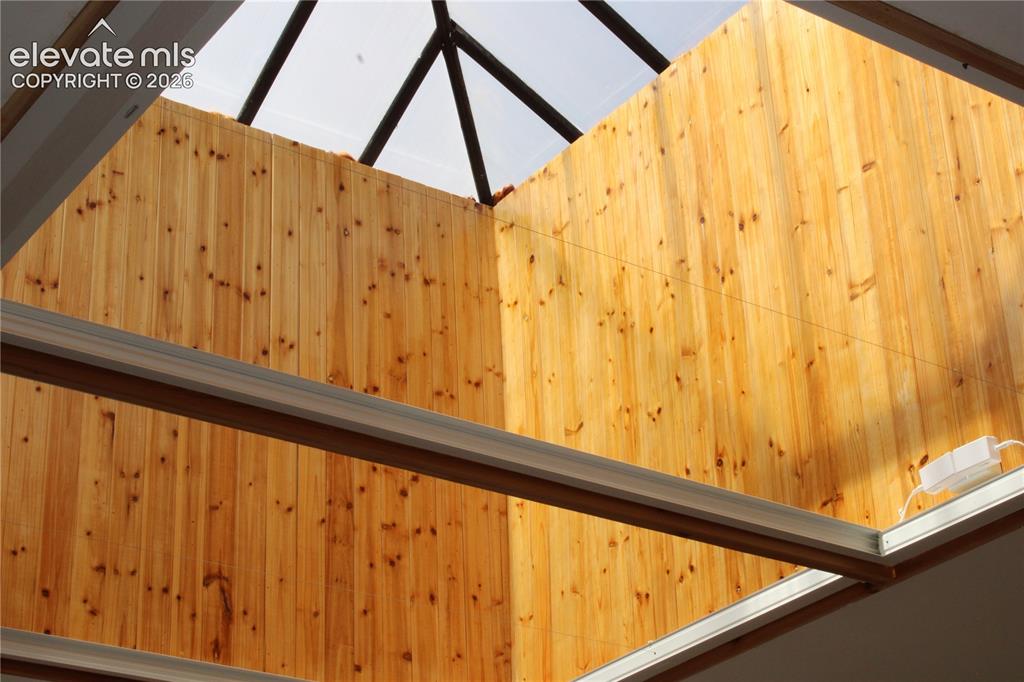 Image 5 of 11: skylight in upstairs apartment, may b closed at night or in bad weather