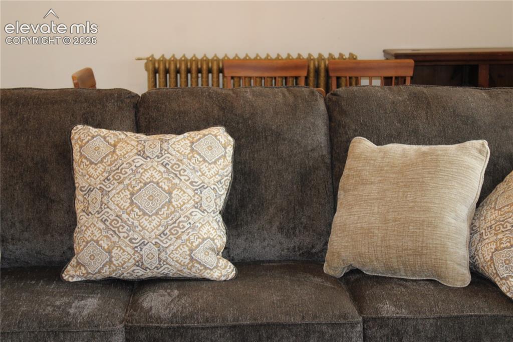 Image 6 of 11: sofa in upstairs apt, included in purchase price