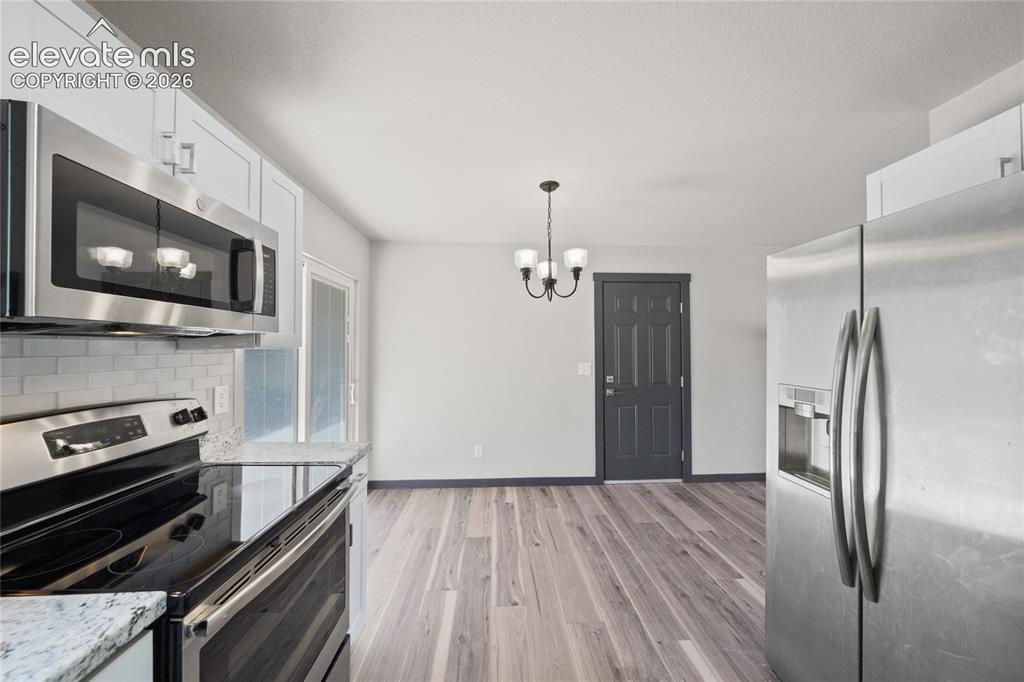 Image 12 of 30: Kitchen