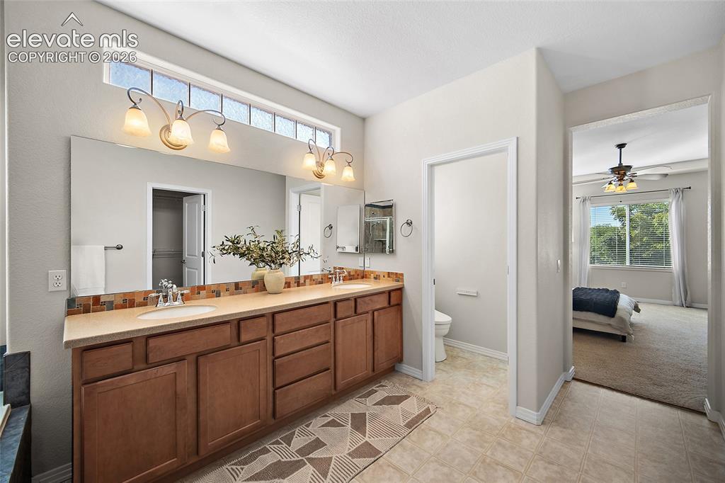 Image 19 of 40: Dual Sinks,  Bidet
