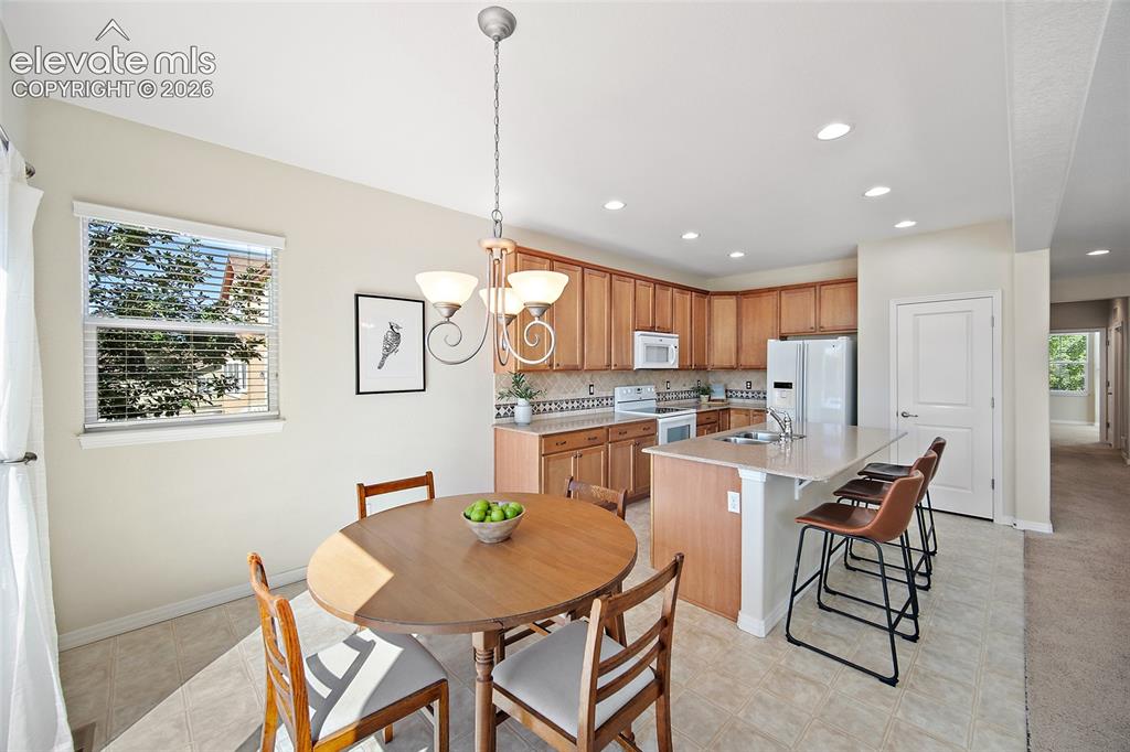 Image 9 of 40: Kitchen, Nook & Breakfast Bar