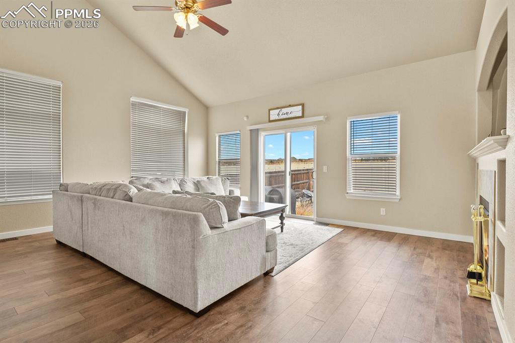 Image 14 of 45: Main level living room with vaulted ceilings