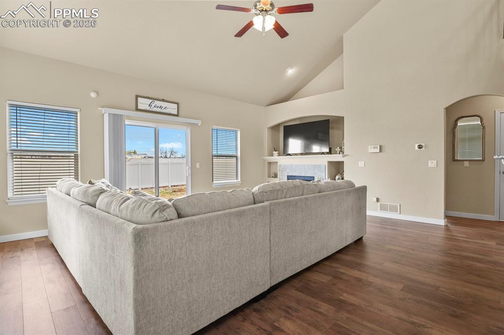 Image 15 of 45: Main level living room with vaulted ceilings