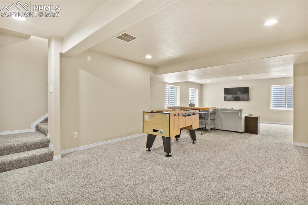 Image 33 of 45: Basement game area