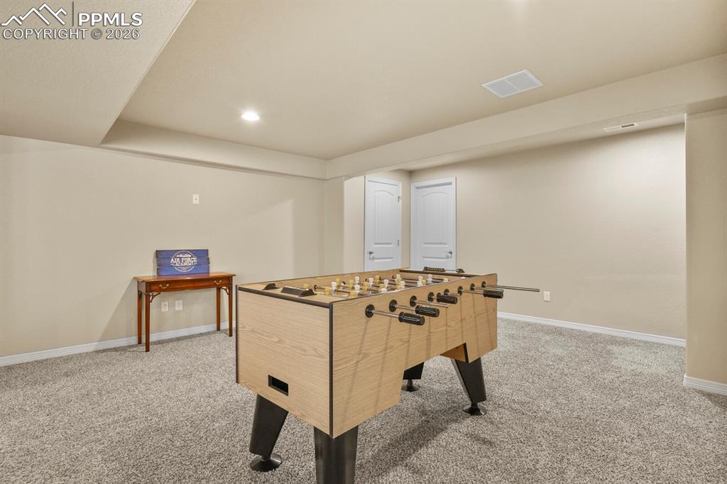 Image 34 of 45: Basement game area