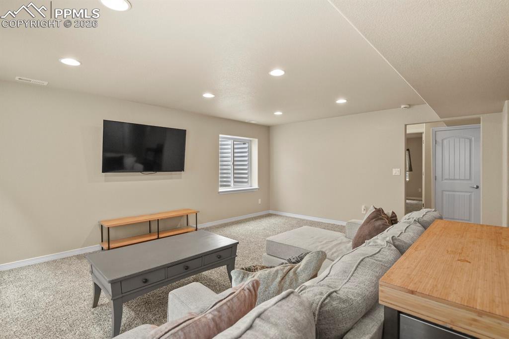 Image 35 of 45: Basement living room area