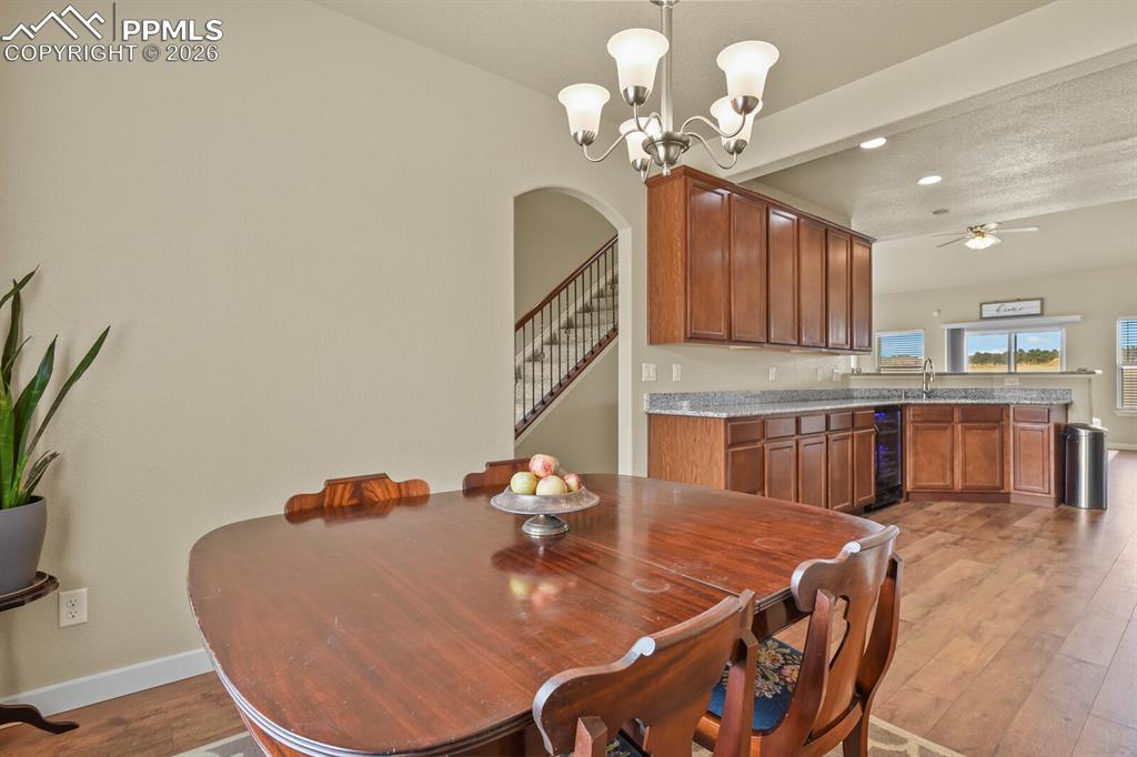 Image 6 of 45: Main level dining room and kitchen