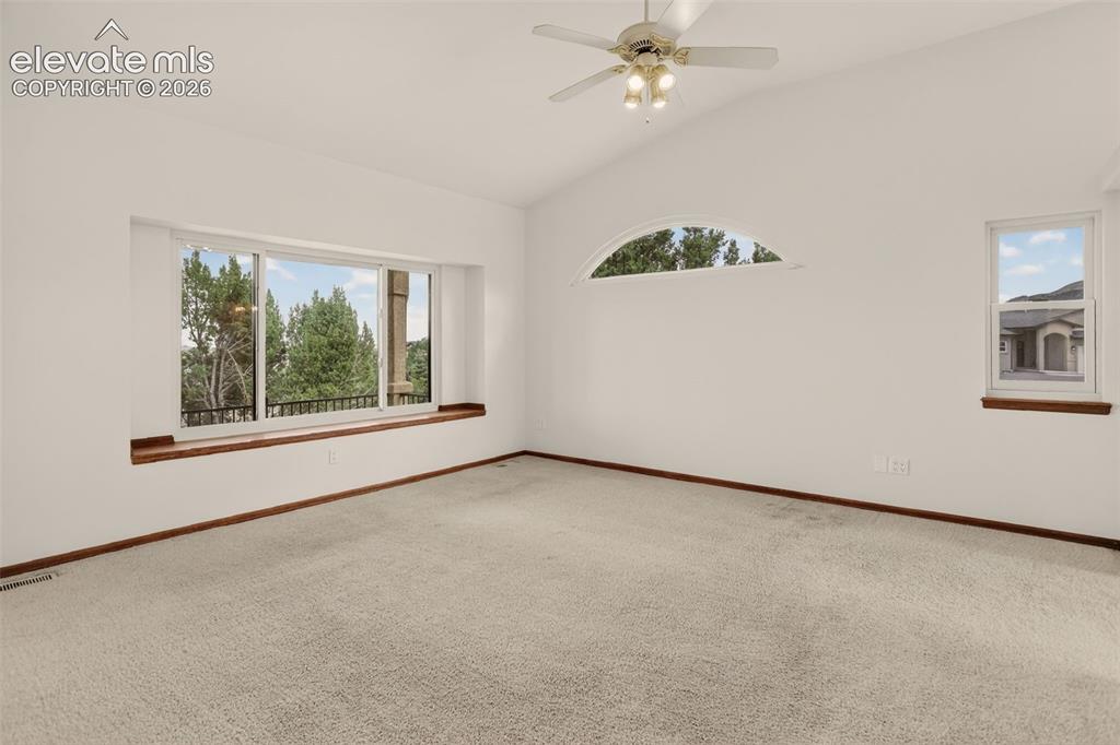 Image 11 of 50: Primary bedroom (adjacent to entryway and living room) 