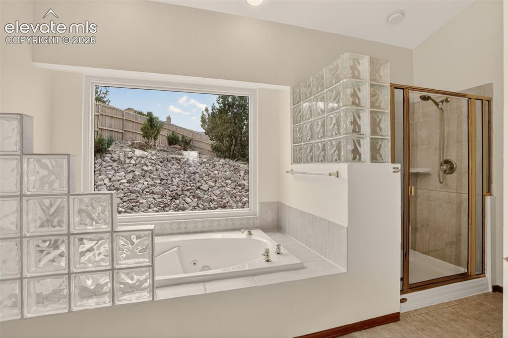 Image 15 of 50: Primary - 5pc bath (stand alone shower and soaking tub)