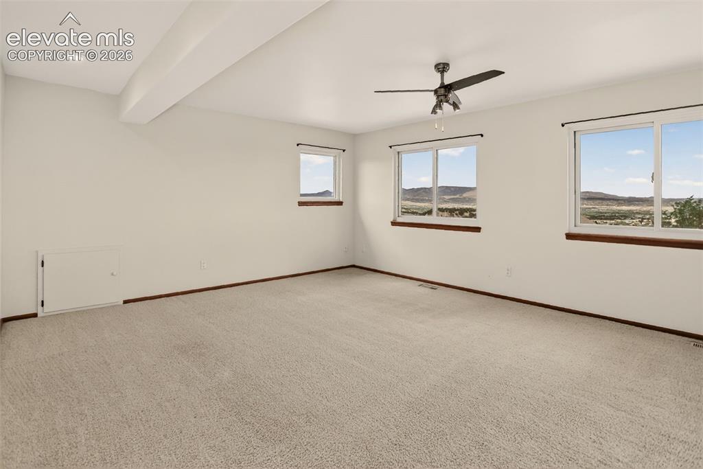 Image 29 of 50: Family room (house has central vacuum system)