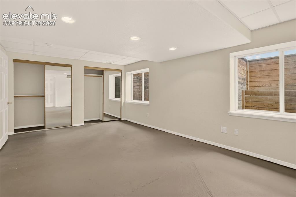 Image 41 of 50: Bedroom (basement)