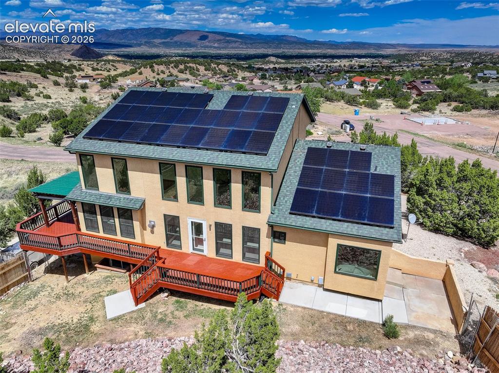 Image 5 of 50: Aerial view - Rear of house. Solar