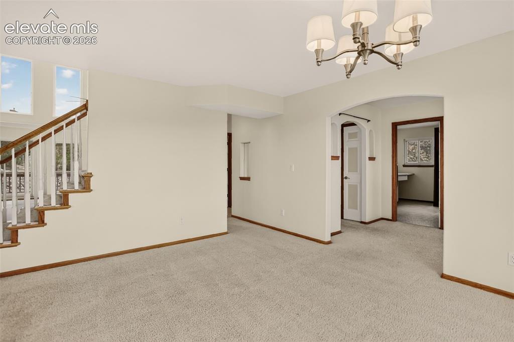 Image 9 of 50: Formal dining room. Entryway is to the left. 