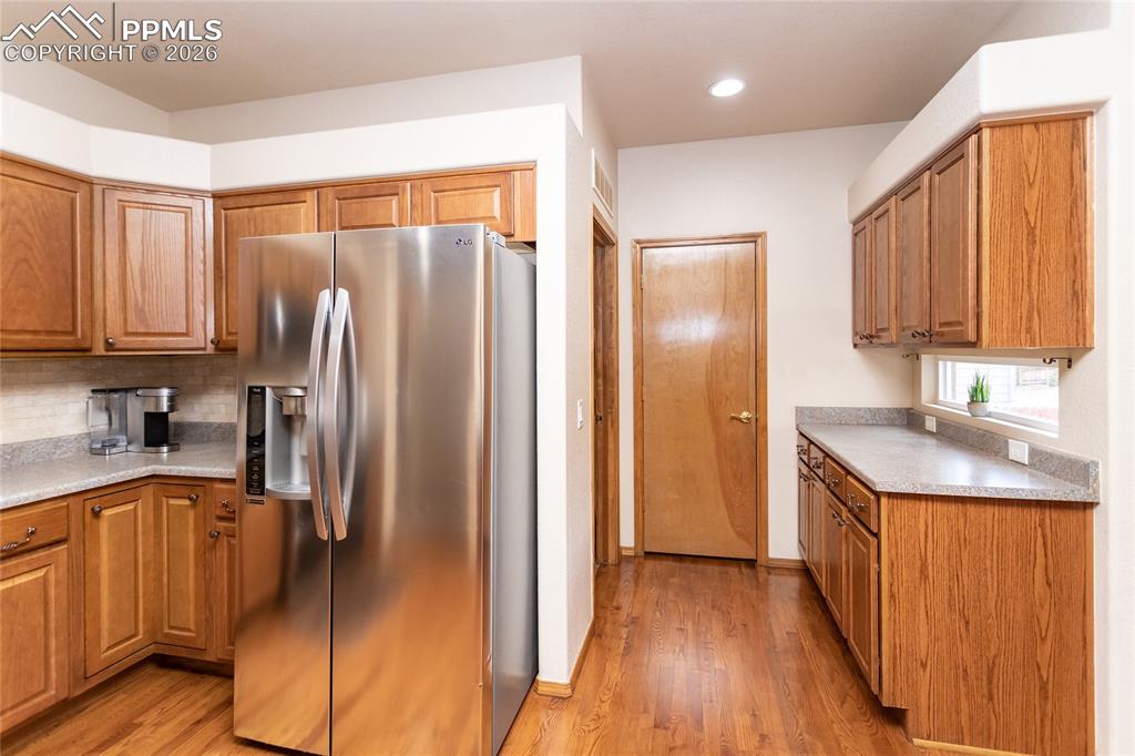 Image 19 of 50: Butlers pantry area offers additional cabinet and counter space.