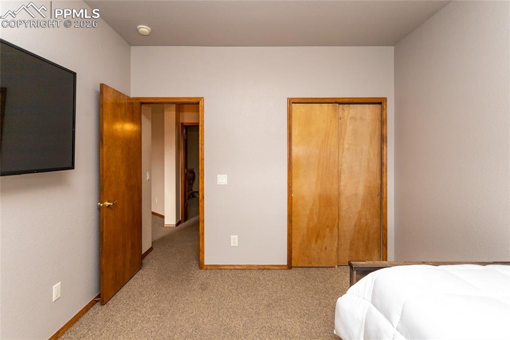 Image 30 of 50: Front bedroom closet.