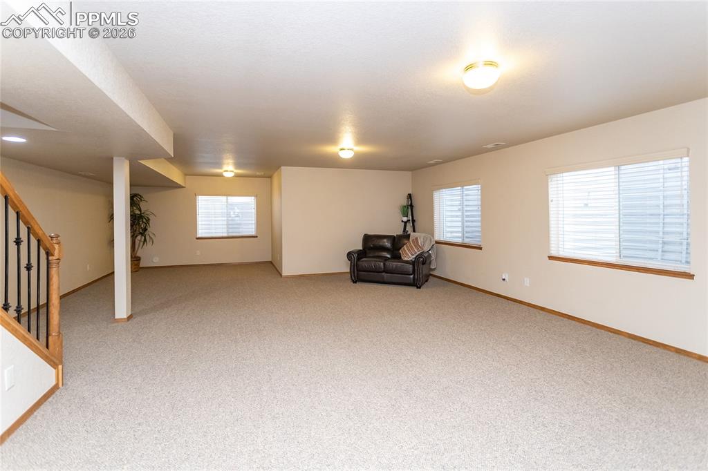 Image 35 of 50: There is plenty of room for a pool table or a future bar area!