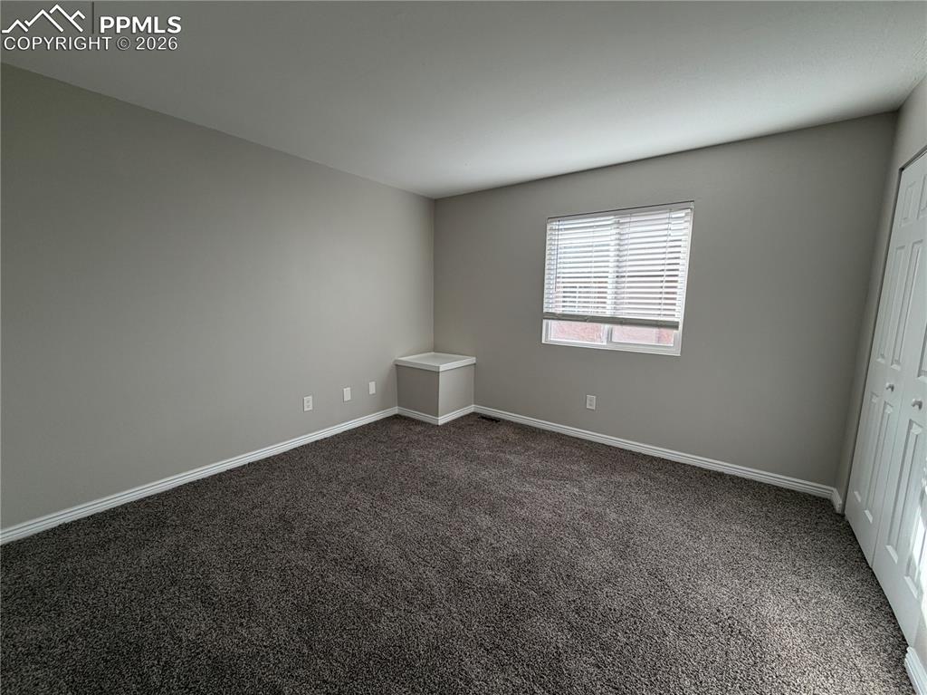 Image 10 of 15: Bedroom