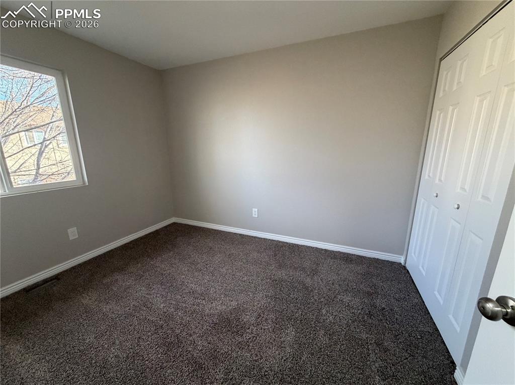 Image 12 of 15: Bedroom