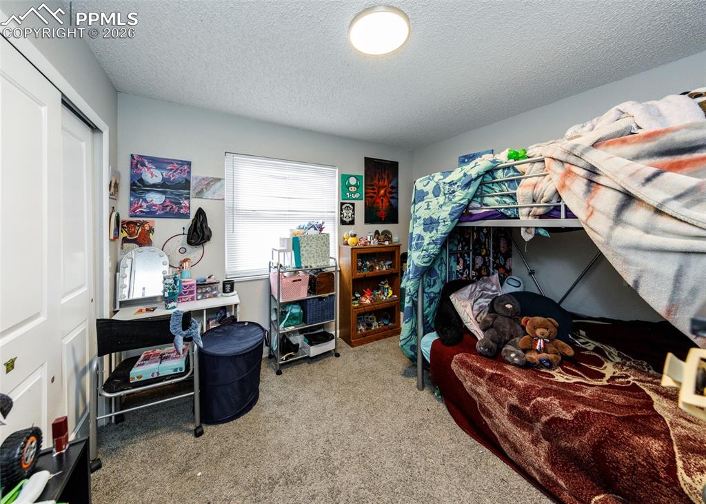 Image 13 of 18: Bedroom