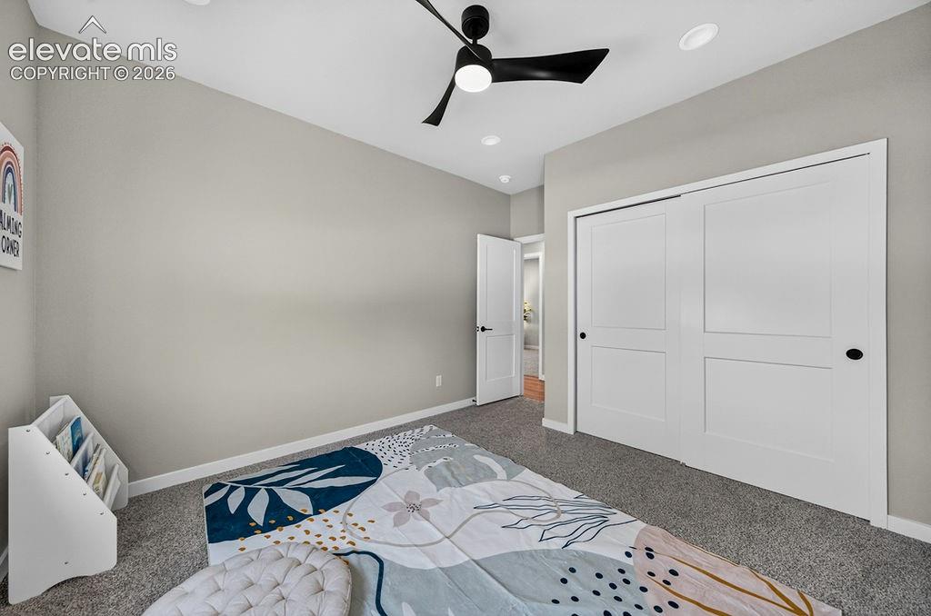 Image 39 of 47: Room featuring neutral-toned walls, recessed lighting, and a contemporary b