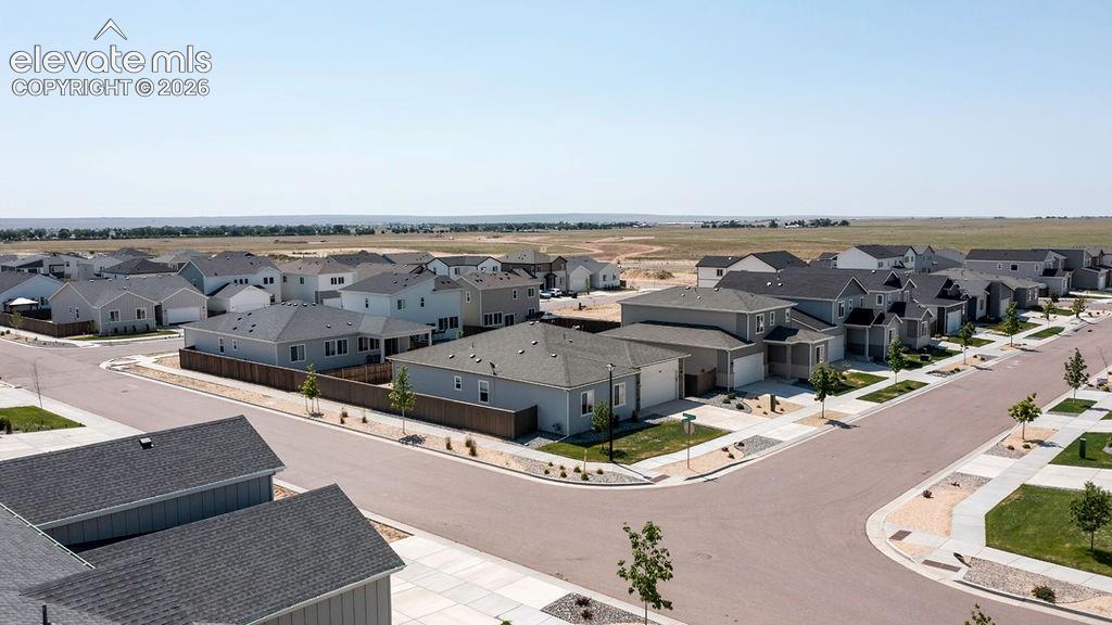 Image 8 of 47: Aerial perspective showcasing a residential development with multiple singl