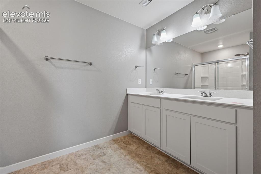 Image 16 of 32: Primary Bath Double Vanity