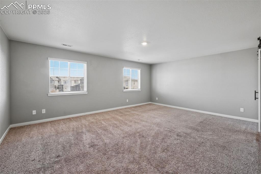 Image 19 of 29: Primary Bedroom Upper Level