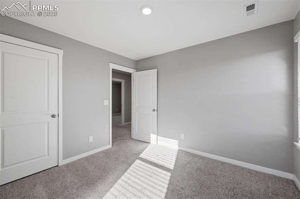 Image 21 of 29: Bedroom 3 Upper Level