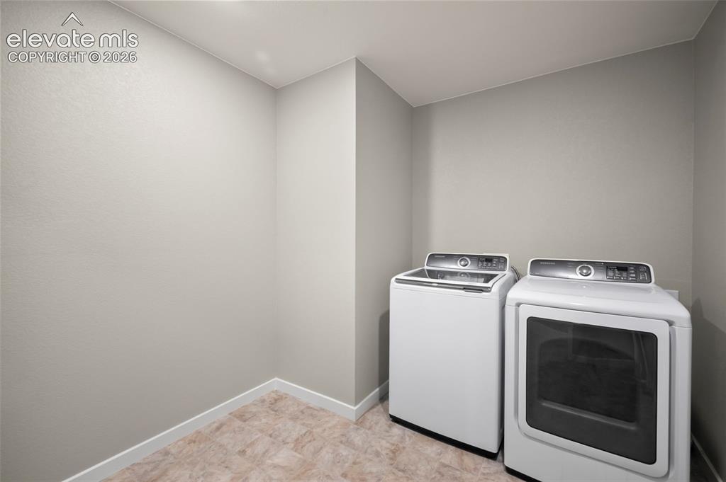 Image 27 of 32: Laundry room Washer and Dryer Stay with the Property