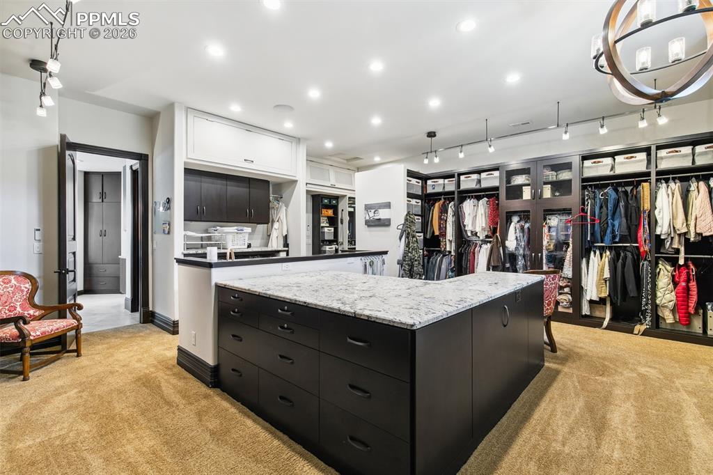 Image 20 of 50: Primary suite closet