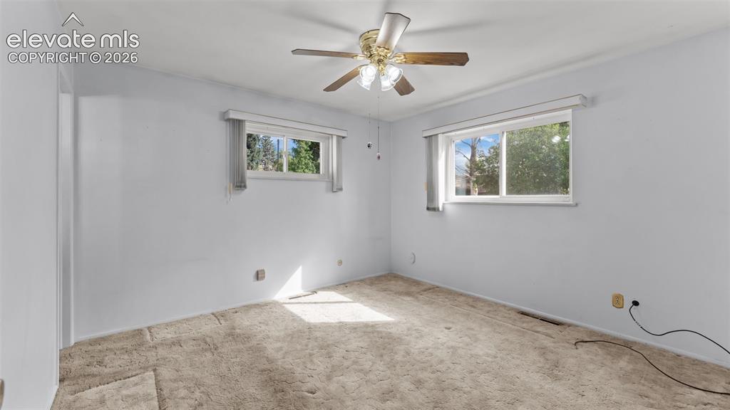 Image 16 of 36: One of 3 main level bedrooms