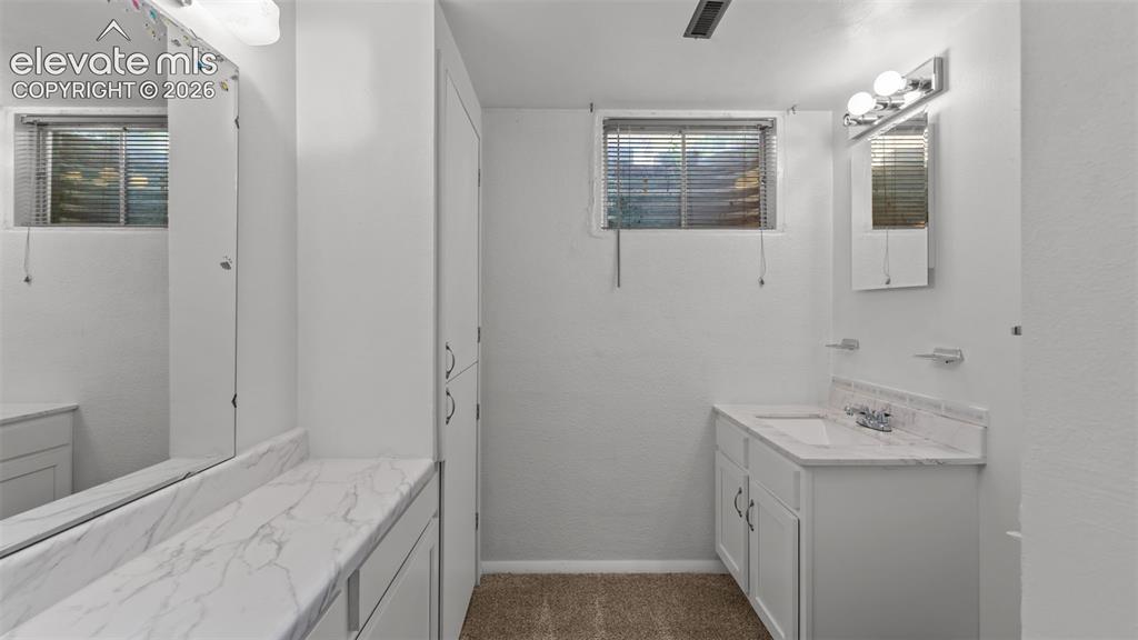 Image 22 of 36: 3/4 bath in basement