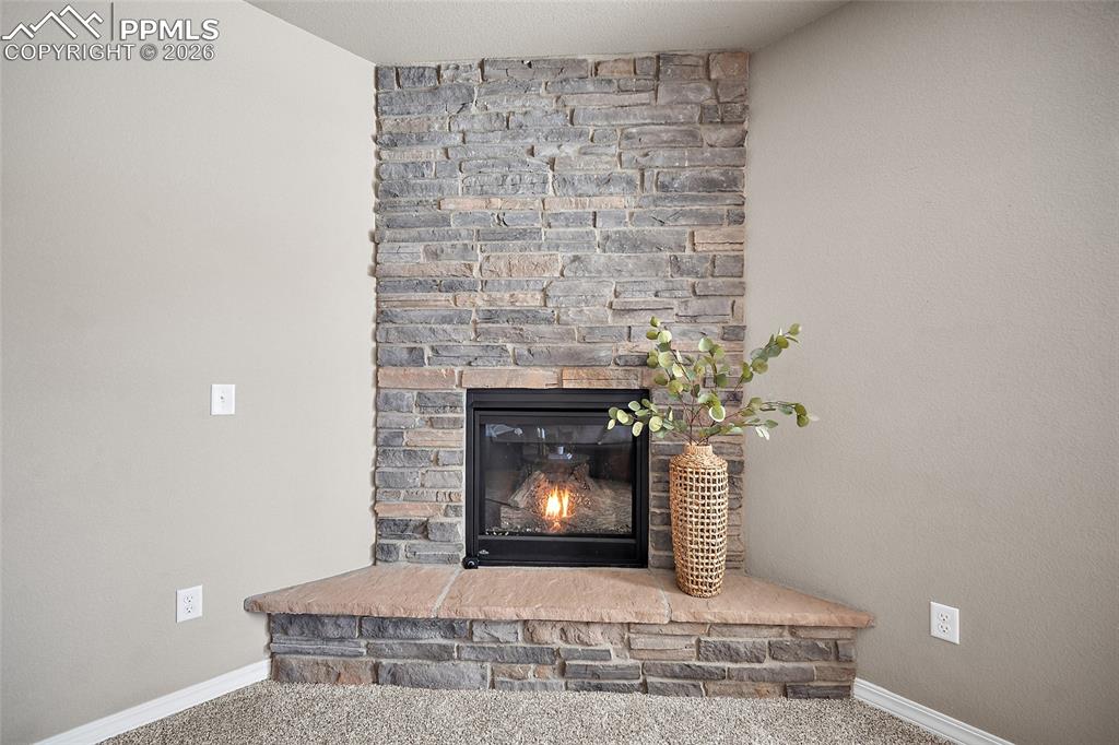 Image 11 of 50: Fireplace