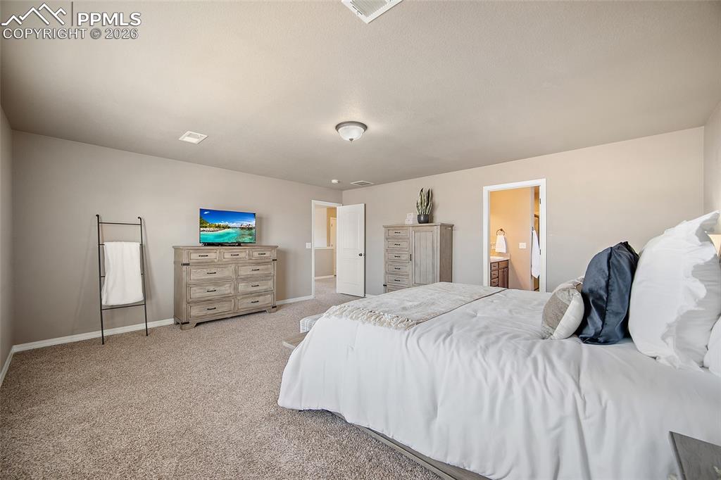 Image 27 of 50: Master Bedroom