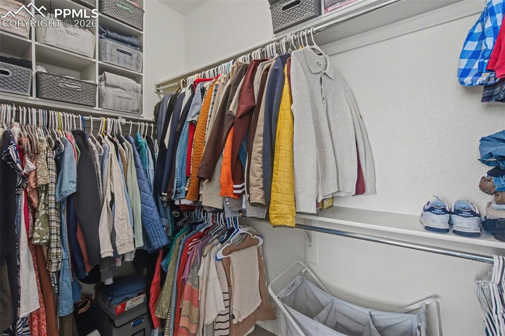 Image 16 of 34: Master room walk in closet