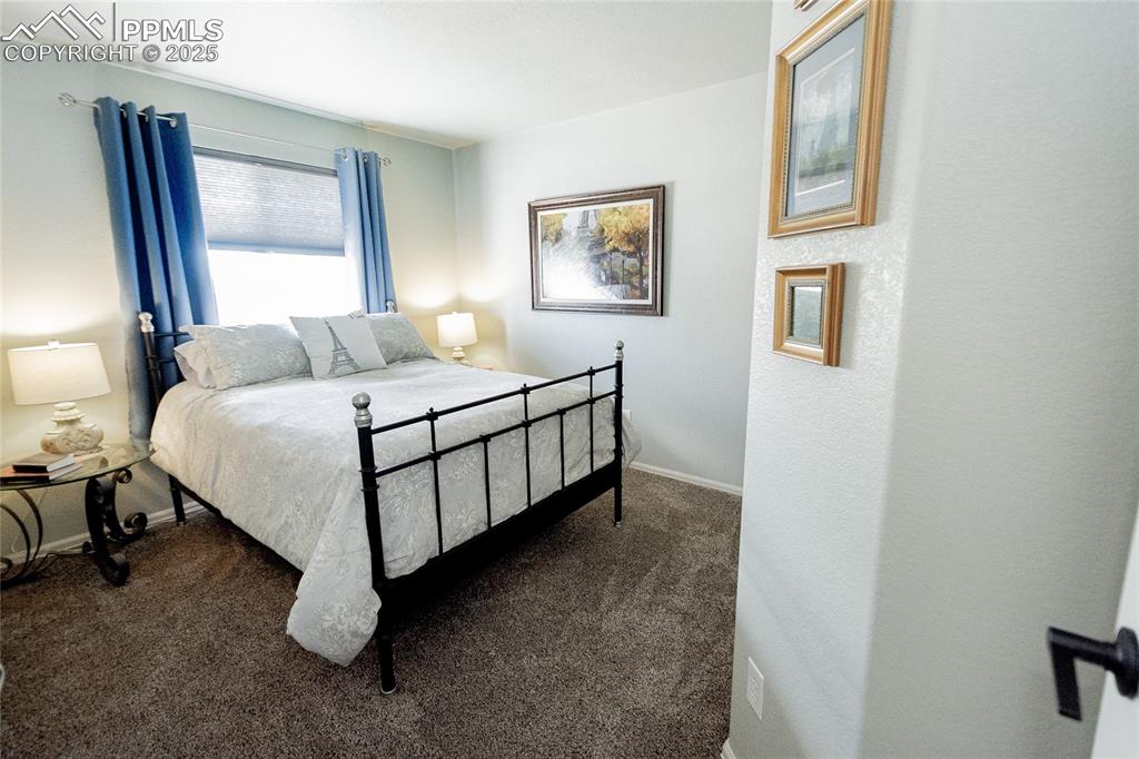 Image 11 of 33: Upper bedroom 2