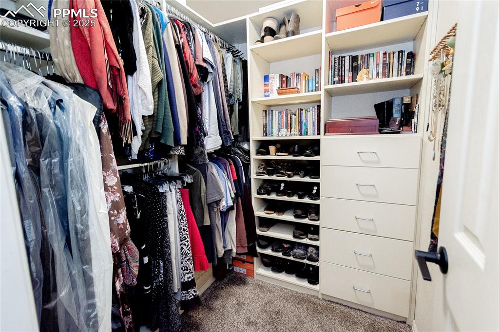 Image 19 of 33: Walk in closet in master