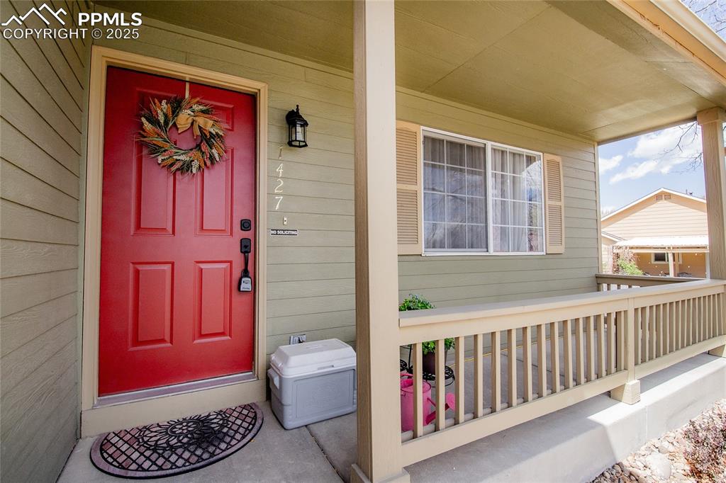 Image 2 of 33: Front door with covered porch