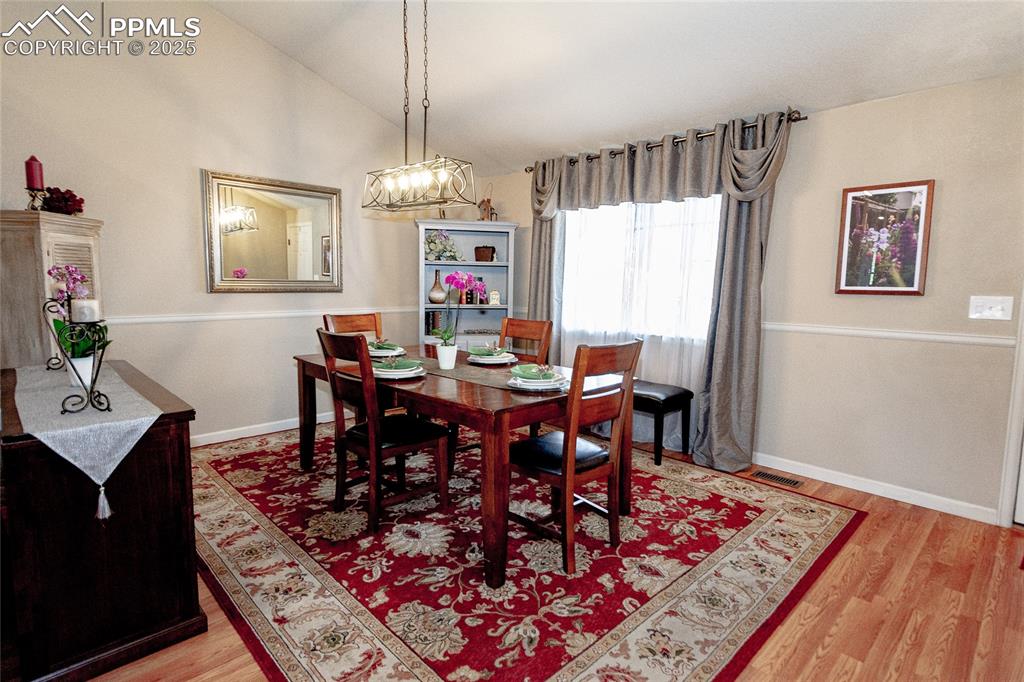Image 4 of 33: Great room featuring as dining space