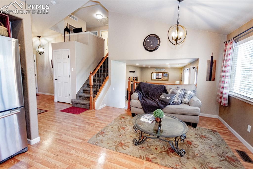 Image 8 of 33: Kitchen view into lower level