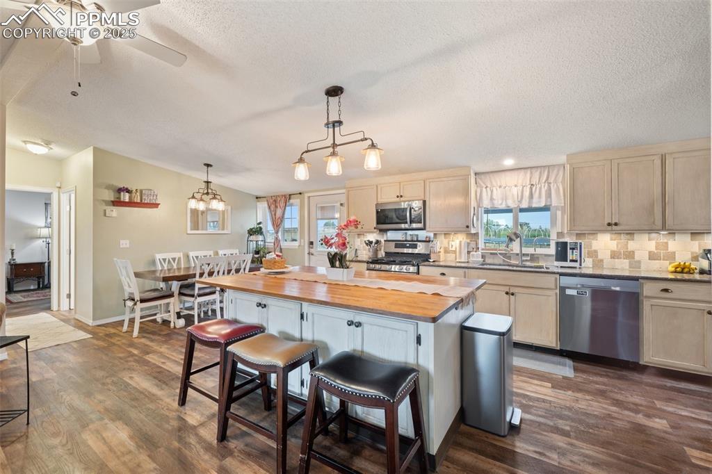Image 18 of 33: Wonderful kitchen with huge island with storage.